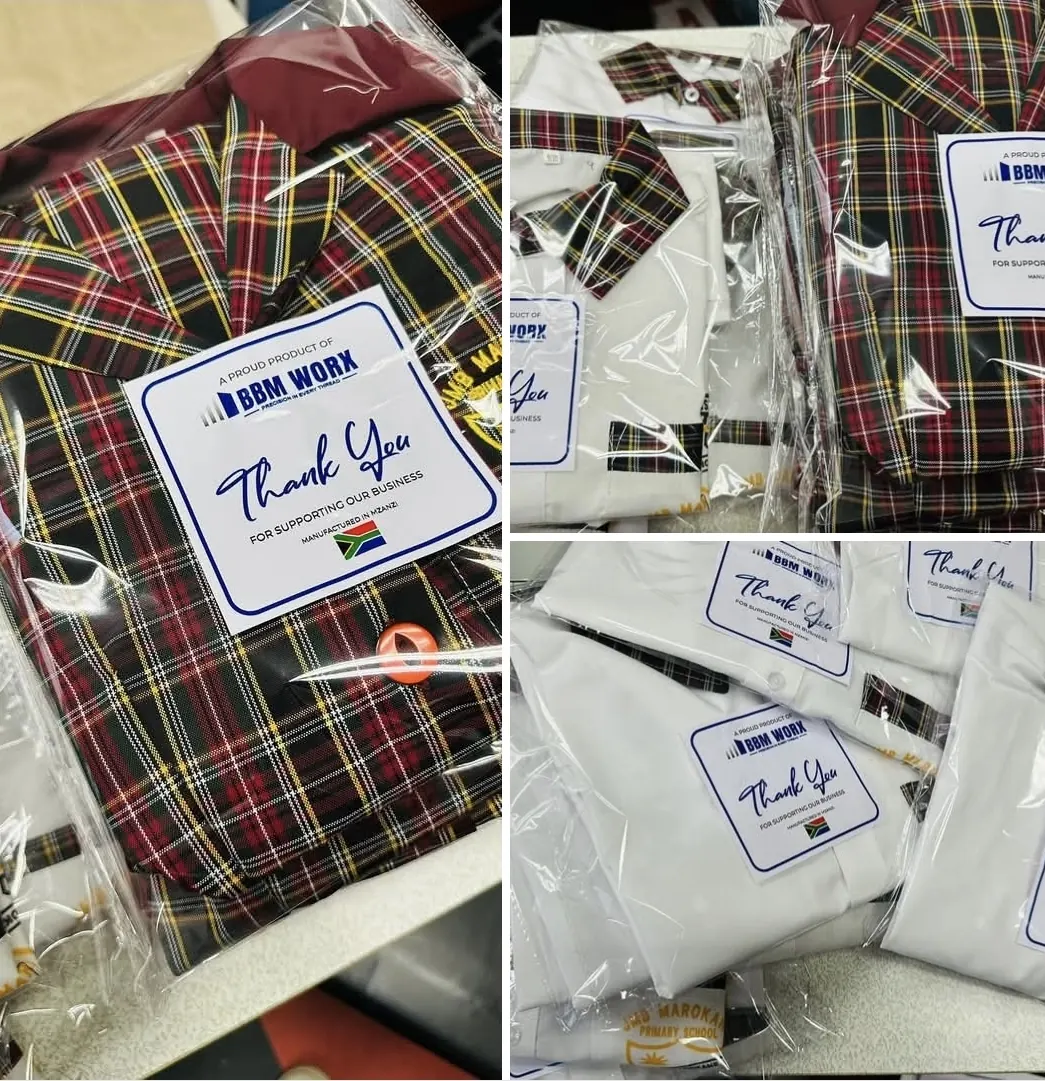 Finished school shirts individually bagged with BMC Manufacturing thank-you labels